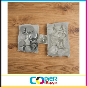 44mm pin badge making material showing steel round plates, clear mylar protective film, and white plastic backs with safety pins